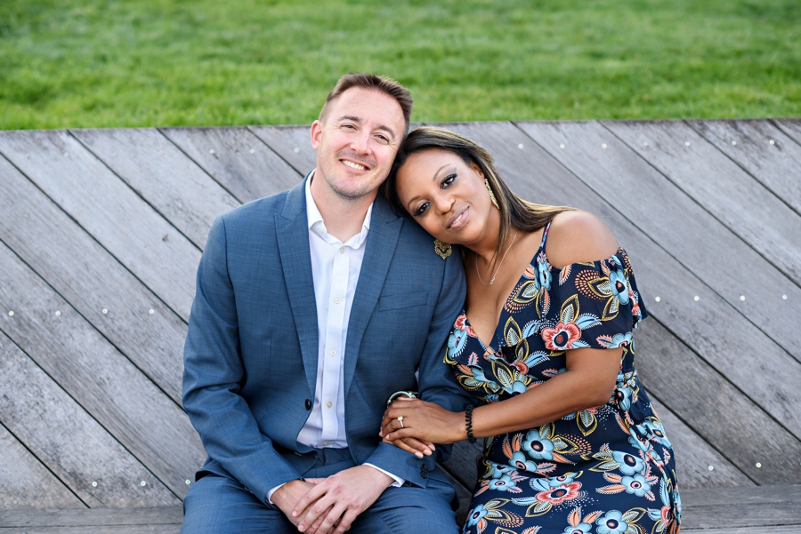 A sweet portrait of a couple on a bench in the park in Hoboken NJ.
